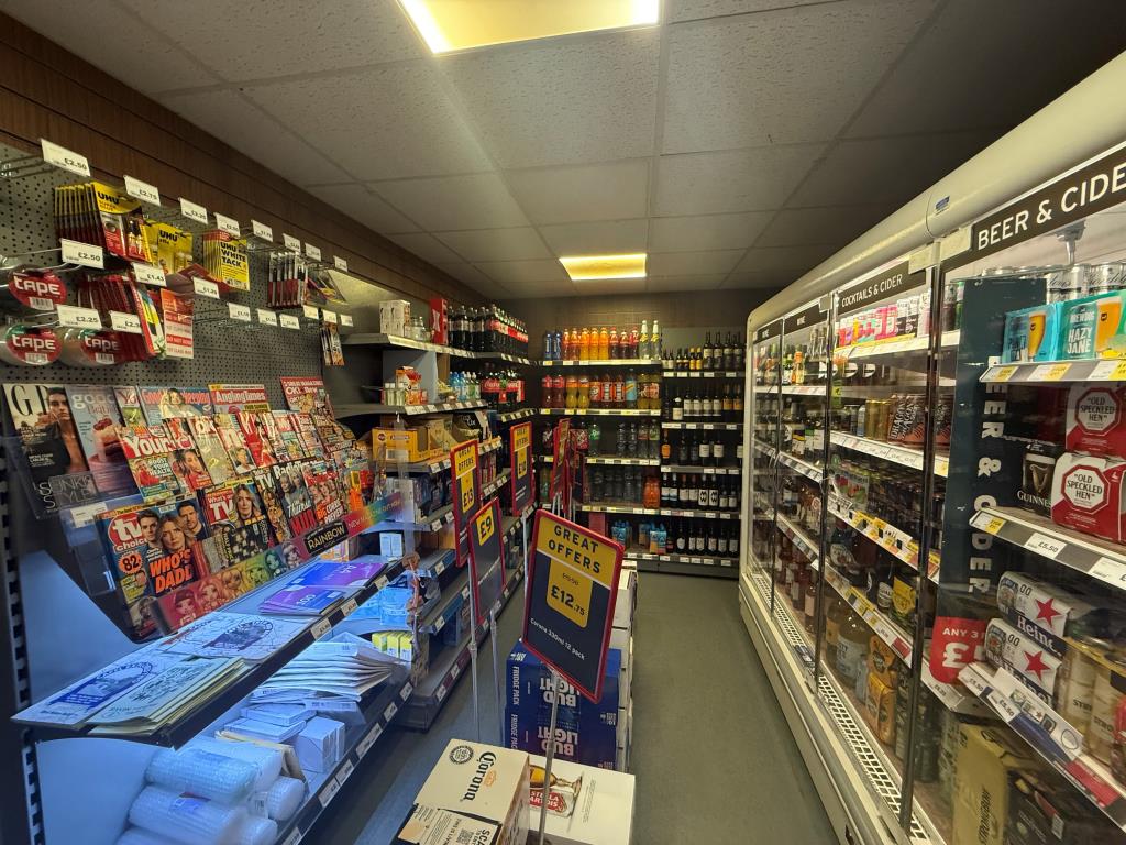Lot: 98 - FREEHOLD CONVENIENCE STORE INVESTMENT AND VACANT SEVEN-BEDROOM HOUSE FOR REFURBISHMENT - Shop